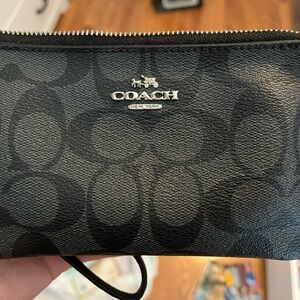 Black and grey toned Coach hand purse